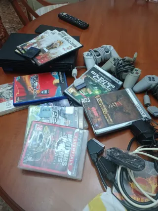 Consola PlayStation 2 con juegos