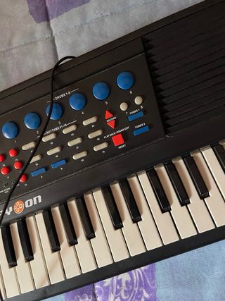 Teclado infantil con micrófono