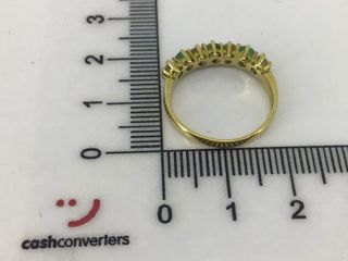 anillo oro 18k con piedra con circonita,esmeralda