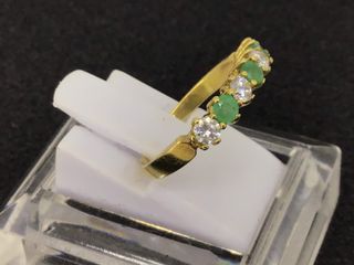 anillo oro 18k con piedra con circonita,esmeralda