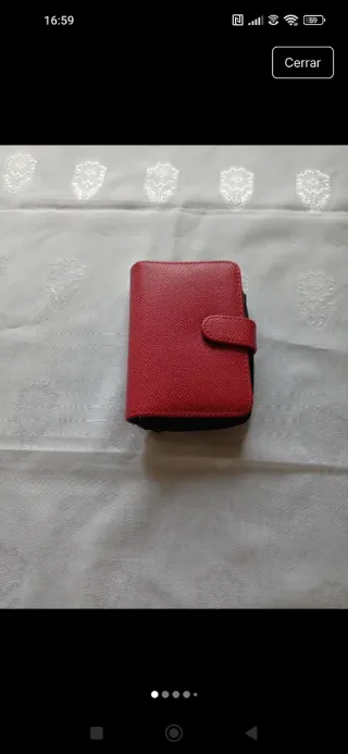 Cartera y libreta roja