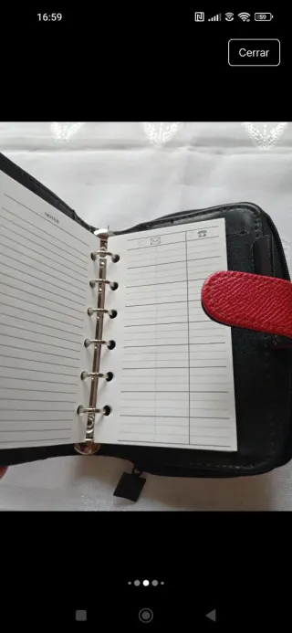 Cartera y libreta roja