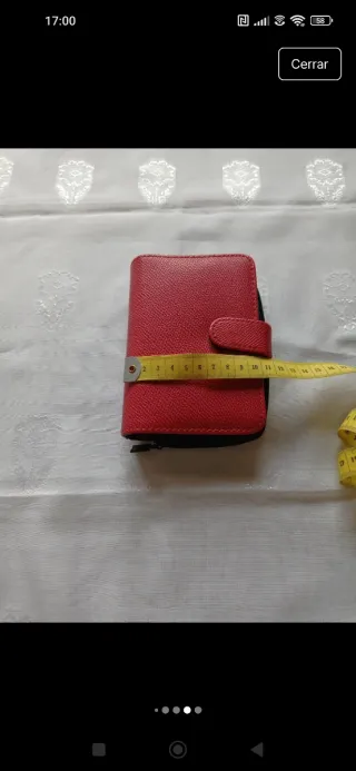 Cartera y libreta roja