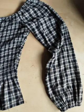 Blusa cuadros manga larga y escote barco