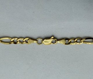 Cadena Figaro de oro de 18k, 6.4 g, 51 cm.