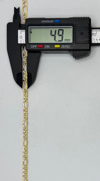 Cadena Figaro de oro de 18k, 6.4 g, 51 cm.
