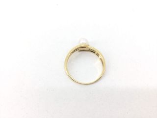 anillo oro 18k con piedra con circonita,perla