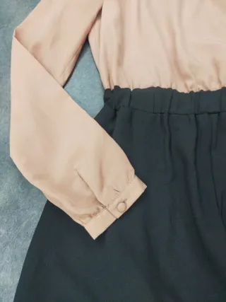 Abito a pantaloni beige e nero