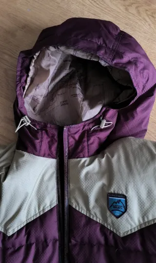Chaqueta Vans plumífera morada y beige