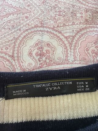 Jersey rayas blanco y negro con detalles rosa