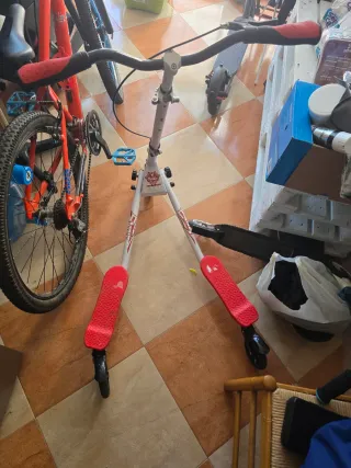 Patineta roja doble en buen estado