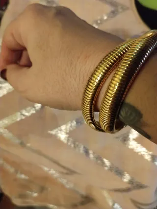 Brazaletes acero dorados estilo serpiente