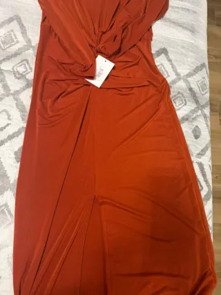 Traje ceremonia naranja rojizo talla M 38-40