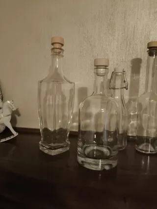 Lotto 6 bottiglie in vetro