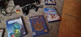 Consola PS2 y 8 Videojuegos