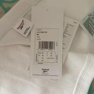 Top Reebok blanco cremallera XS