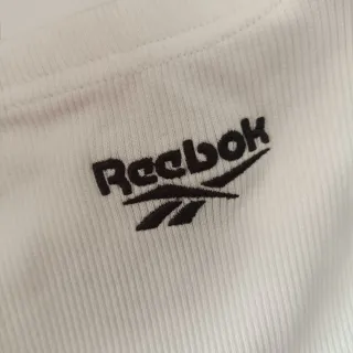 Top Reebok blanco cremallera XS
