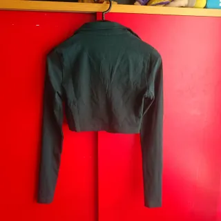 Top Reebok verde talla XS con etiqueta