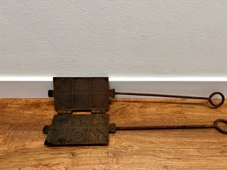 Gofrera antigua de hierro fundido