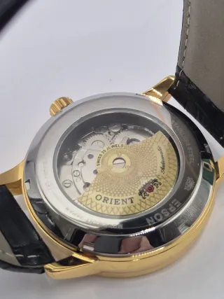 Reloj Mod Orient Automático Dorado y Blanco