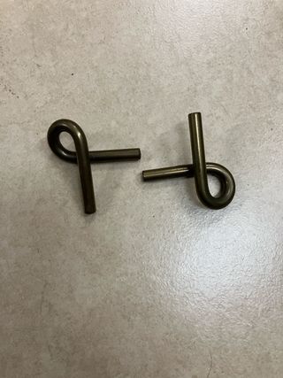 Rompecabezas de clavos entrelazados