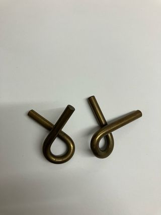 Rompecabezas de clavos entrelazados