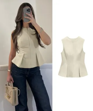 Top beige sin mangas con cremallera