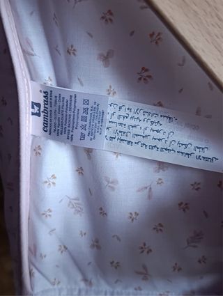 Cuco blanco y rosa para bebé