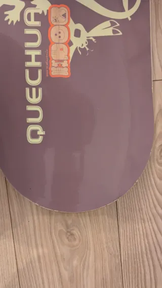 Snowboard Quechua con fijaciones