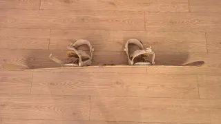 Snowboard Quechua con fijaciones