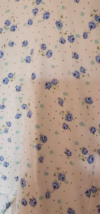 Traje de flamenca flores blanco y azul.