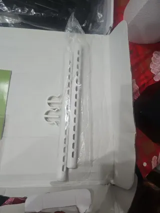 Reposa de pies para niños en silleta para coche.