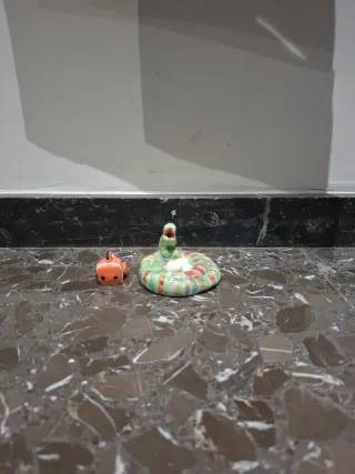 Muñecos de cerámica: pez y serpiente