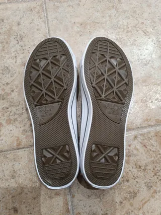 Playeras azules y blancas