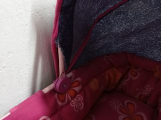 capazo de juguete para muñeca