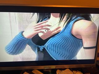 Consola PlayStation 1 Sony Gris con juegos.