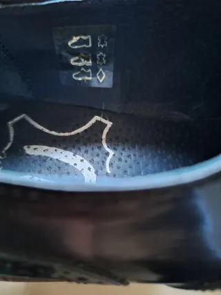 Zapatos de mujer negros con flecos