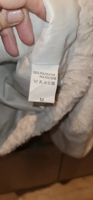 Giacca in pelliccia sintetica panna