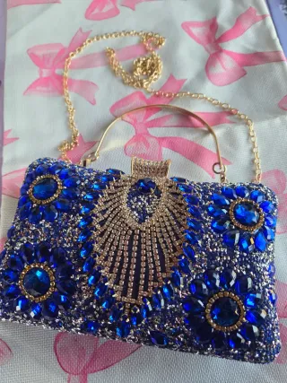 Bolso de fiesta azul con detalles dorados
