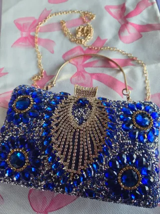 Bolso de fiesta azul con detalles dorados
