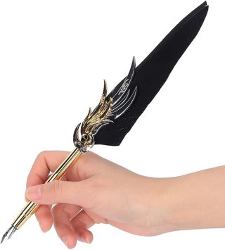 Set Pluma de tinta negra con diseño de alas dorada