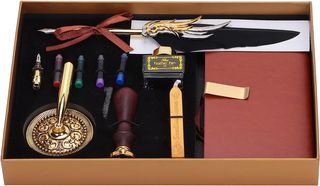 Set Pluma de tinta negra con diseño de alas dorada