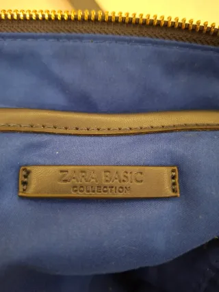 Bolso azul marino con asas y bandolera