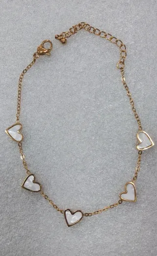 Pulsera Corazones Acero Inoxidable dorado.