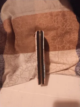 Cartera de mano con estampado