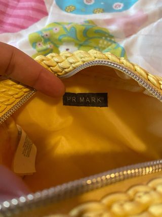 Neceser amarillo tejido