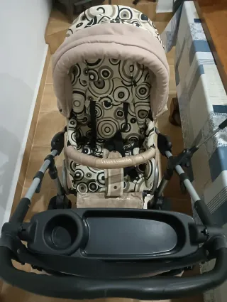 Carro de bebé color beige