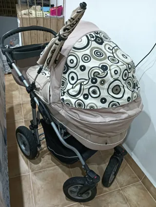 Carro de bebé color beige