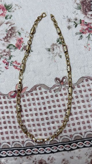 Cadena de oro 14k con detalles motivo versace