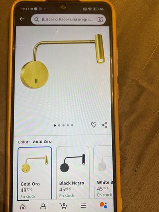 Lámpara de pared dorada de metal